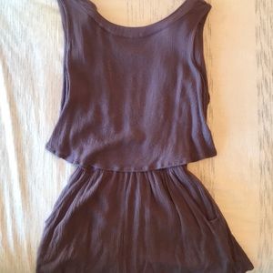 purple romper with button in the back